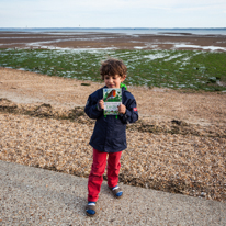 Hill Head - 09 August 2013 / Oscar showing off his new bug's book