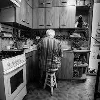 Sant Boi - 24 August 2013 / The grand dad preparing some food and cleaning a few dishes. He is such a nice guy...