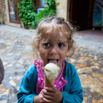 Peratallada - 26 August 2013 / Possibly the most thematic image of these holidays, Alana having an ice-cream