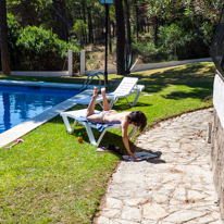 Begur - 30 August 2013 / Jess relaxing by the swimming pool