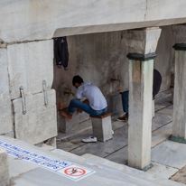 Istanbul - 3-5 October 2013 / Young guy cleaning his feet before the prayer