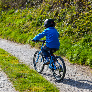 Dinas Island - 15 April 2014 / Oscar riding his bike by the cottage