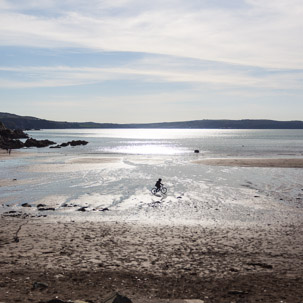 Dinas Island - 15 April 2014 / Oscar riding his bike on the beach