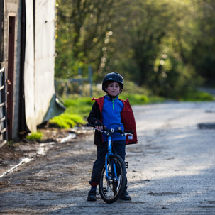 Dinas Island - 15 April 2014 / Oscar cycling around the farm