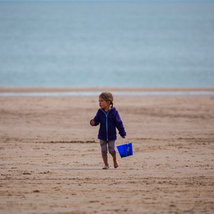 Tenby - 17 April 2014 / Alana trying to empty the sea...