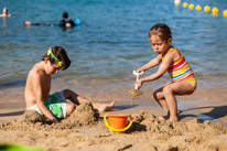 Begur - 27 August 2014 / Alana and Oscar playing with sand